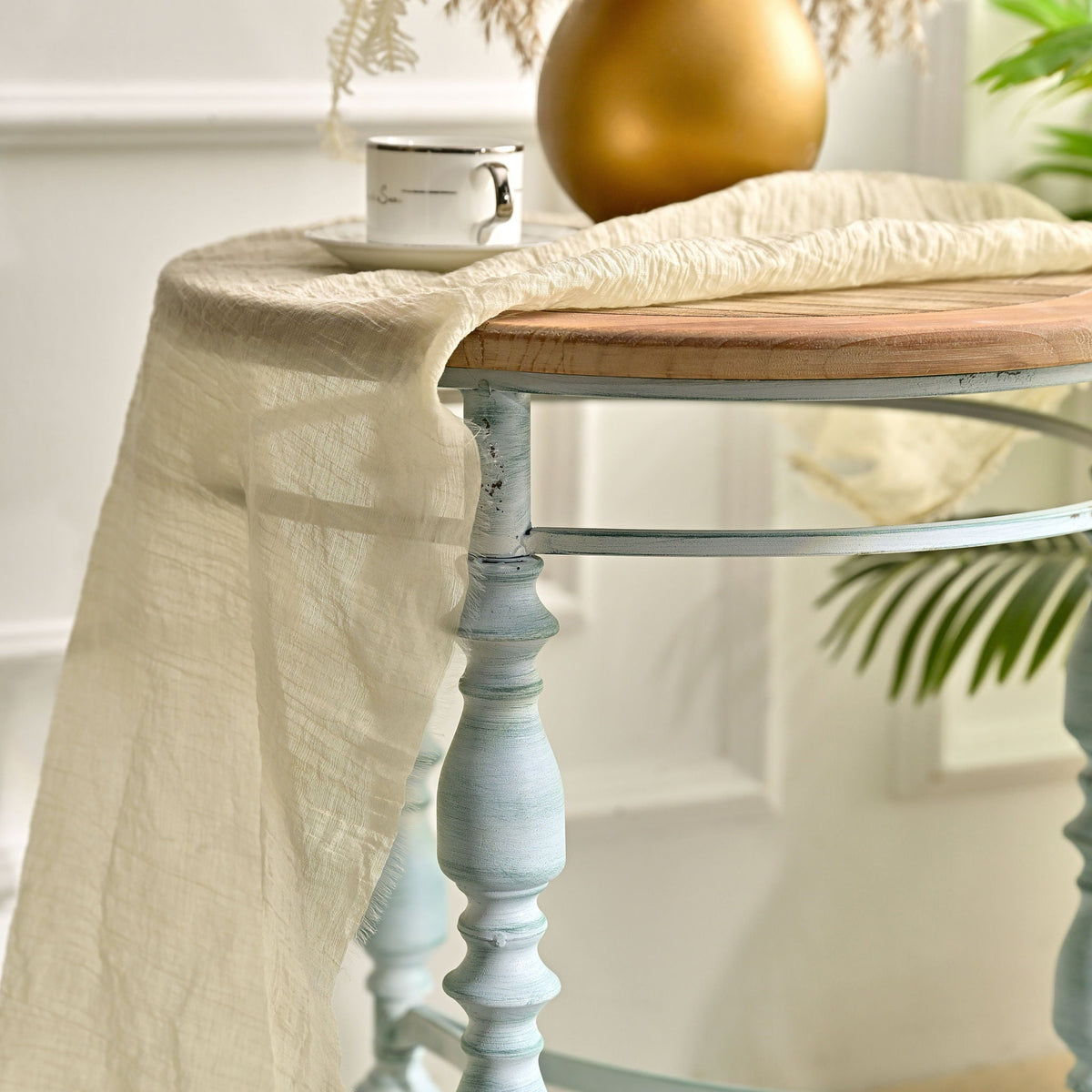 Round Top Carved Coffee Table with Metal Legs - Light Brown