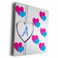 3dRose Fun Colorful Pink and Blue Hearts Pattern Monogram... - Museum Grade Canvas Wrap (cw_215348)