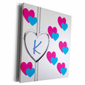 3dRose Fun Colorful Pink and Blue Hearts Pattern Monogram... - Museum Grade Canvas Wrap (cw_215358)