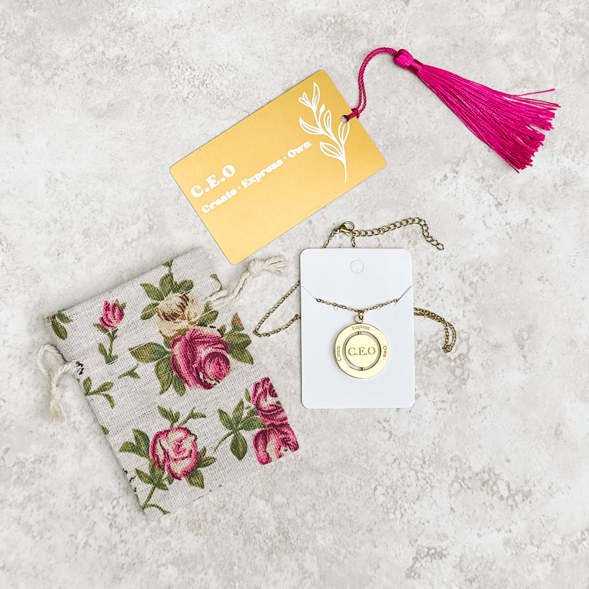 C.E.O Spinner Necklace (Stainless Steel) + Bookmark — Create • Express • Own