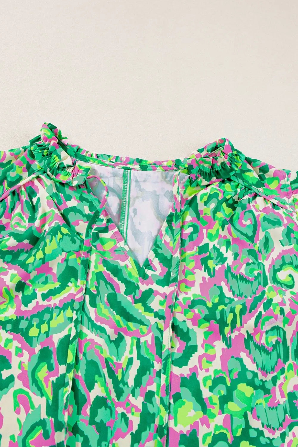 Abstract Print Ruffled Trim Tie Neck Top